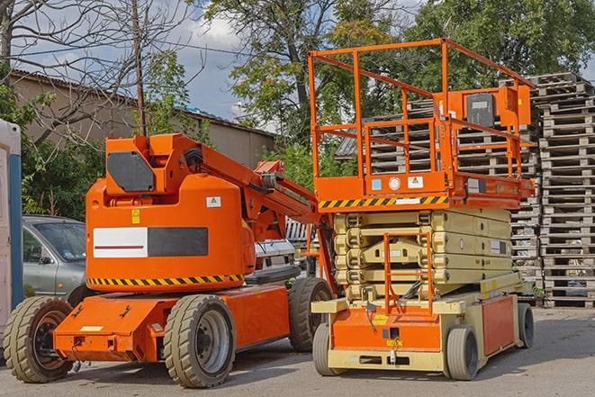 industrial forklift transporting goods in a warehouse in Munford